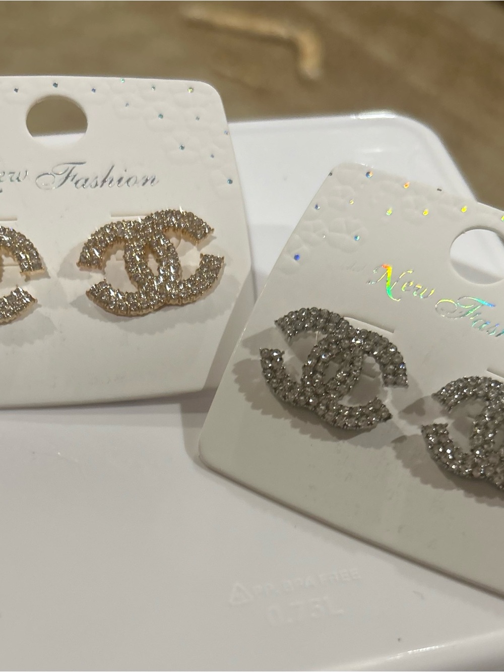 Sparkling Interlocking Stud Earrings - Gold and Silver, 2 pairs - Picture 3 of 7